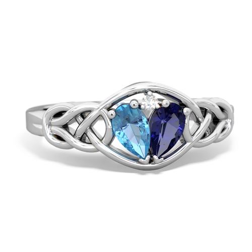 blue topaz-lab sapphire celtic knot ring