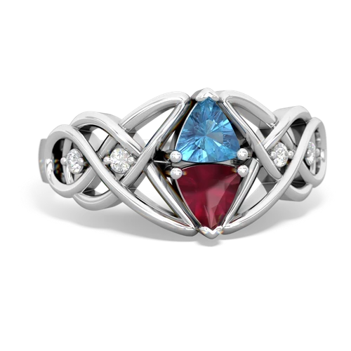 blue topaz-ruby celtic knot ring