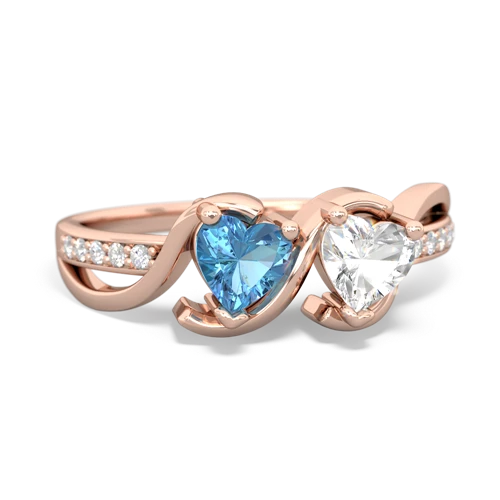blue topaz-white topaz double heart ring