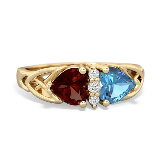 garnet-blue topaz celtic ring