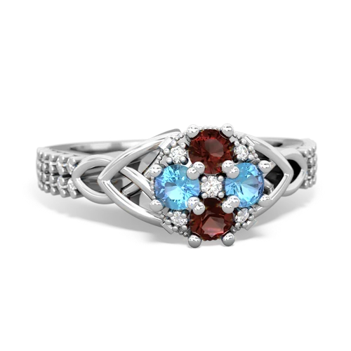 garnet-blue topaz engagement ring