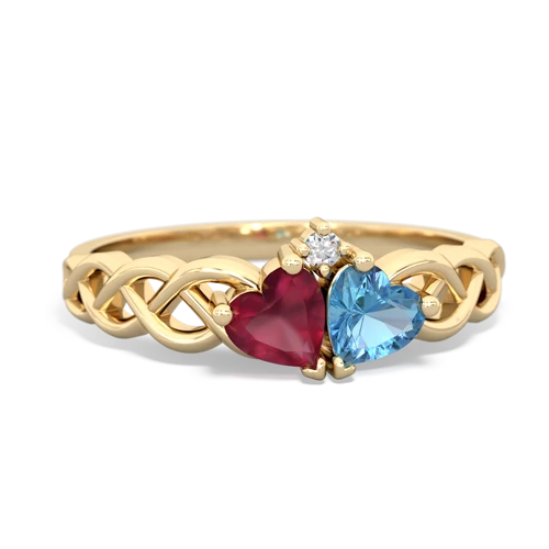 ruby-blue topaz celtic braid ring