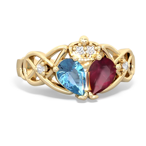 ruby-blue topaz claddagh ring