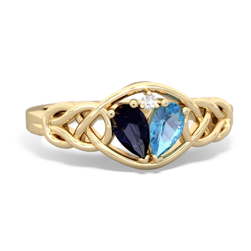 sapphire-blue topaz celtic knot ring