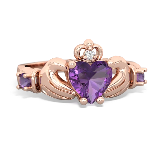 pink sapphire-blue topaz claddagh ring