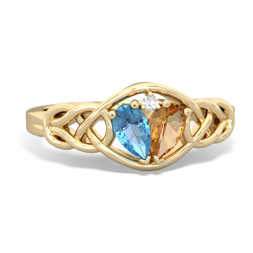 blue topaz-citrine celtic knot ring