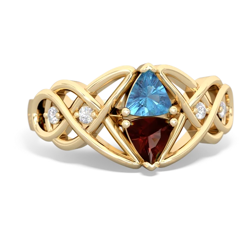 blue topaz-garnet celtic knot ring