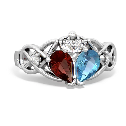 blue topaz-garnet claddagh ring