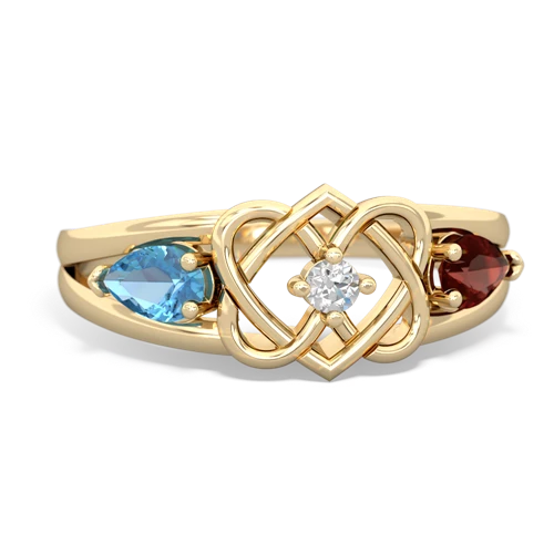 blue topaz-garnet double heart ring