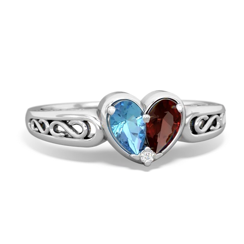 blue topaz-garnet filligree ring