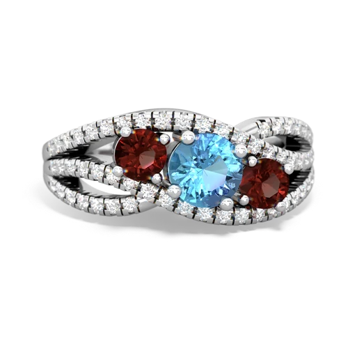 blue topaz-garnet three stone pave ring