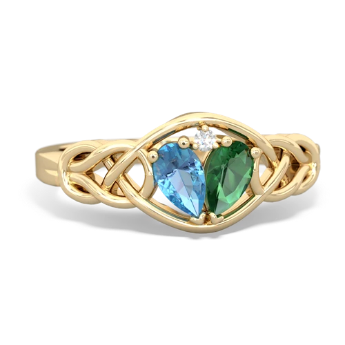 blue topaz-lab emerald celtic knot ring