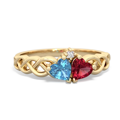 blue topaz-lab ruby celtic braid ring