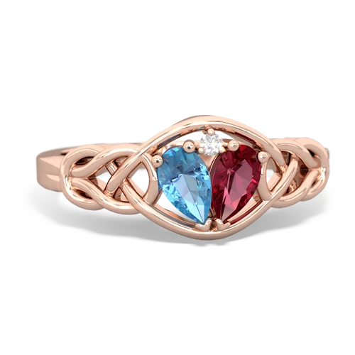 blue topaz-lab ruby celtic knot ring