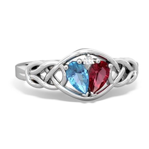 blue topaz-lab ruby celtic knot ring