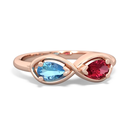 blue topaz-lab ruby infinity ring