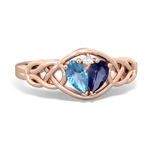 blue topaz-lab sapphire celtic knot ring