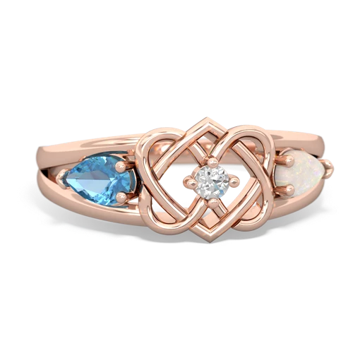 blue topaz-opal double heart ring