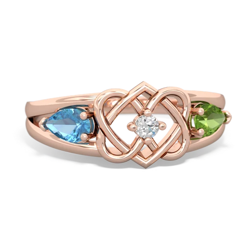 blue topaz-peridot double heart ring