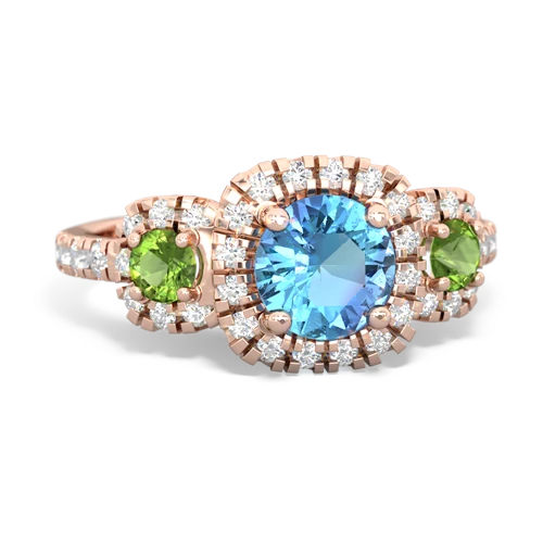 blue topaz-peridot three stone regal ring