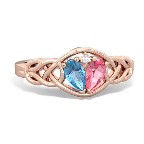 blue topaz-pink sapphire celtic knot ring