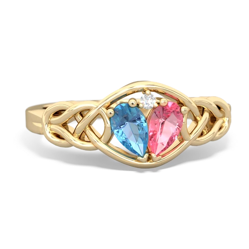 blue topaz-pink sapphire celtic knot ring