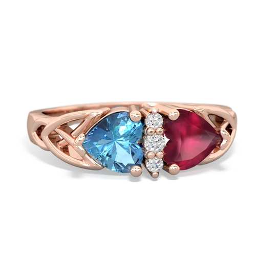 blue topaz-ruby celtic ring