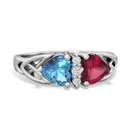 blue topaz-ruby celtic ring