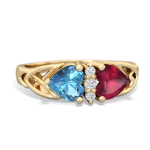 blue topaz-ruby celtic ring