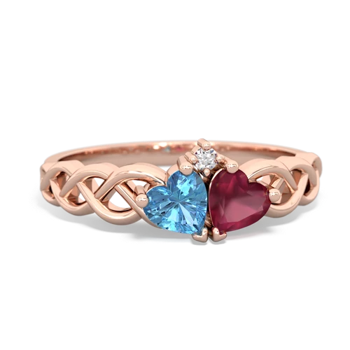 blue topaz-ruby celtic braid ring