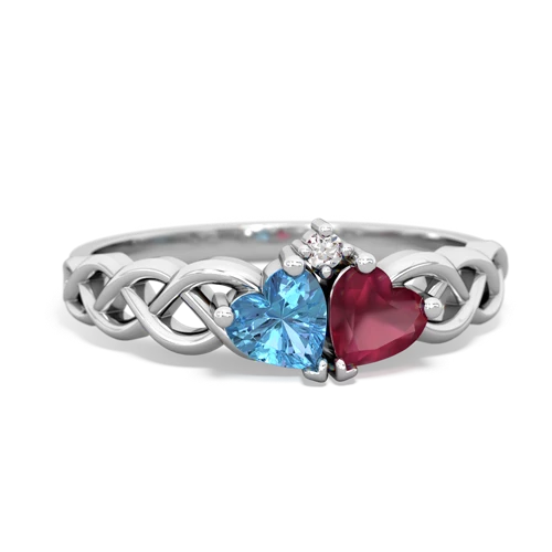 blue topaz-ruby celtic braid ring