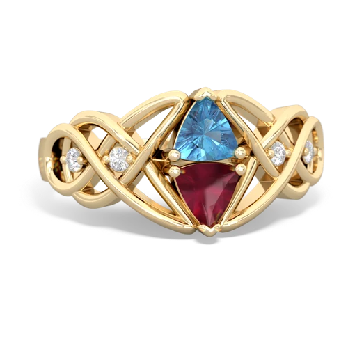 blue topaz-ruby celtic knot ring