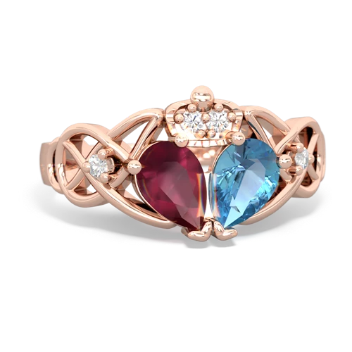 blue topaz-ruby claddagh ring