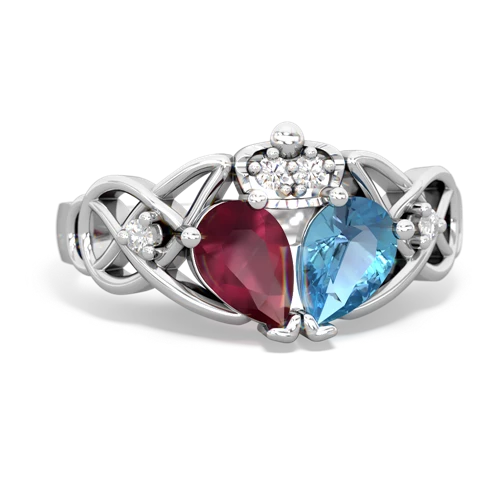 blue topaz-ruby claddagh ring