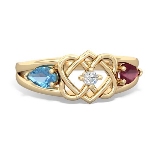 blue topaz-ruby double heart ring