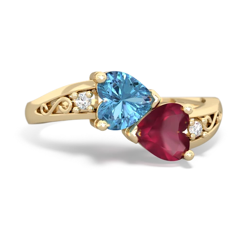 blue topaz-ruby filligree ring
