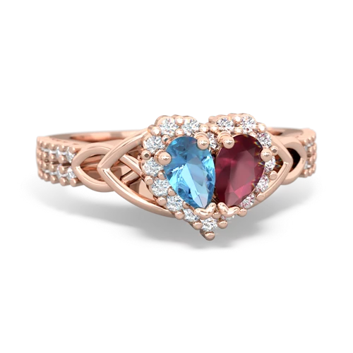 blue topaz-ruby keepsake engagement ring