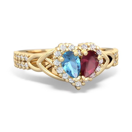 blue topaz-ruby keepsake engagement ring