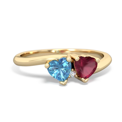 blue topaz-ruby sweethearts promise ring