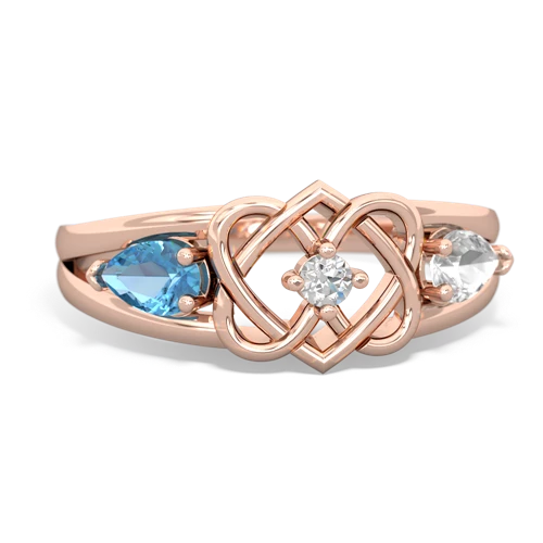 blue topaz-white topaz double heart ring