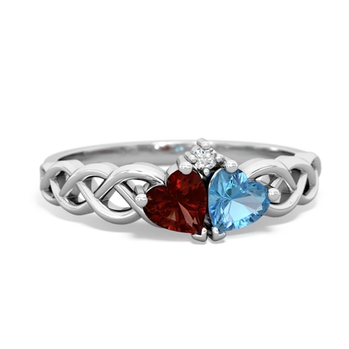 garnet-blue topaz celtic braid ring