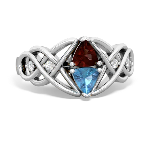 garnet-blue topaz celtic knot ring