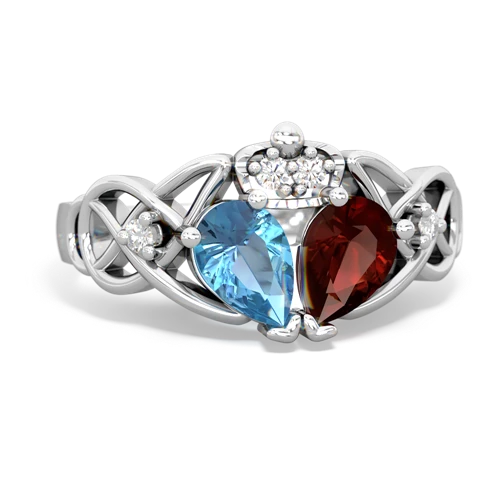 garnet-blue topaz claddagh ring