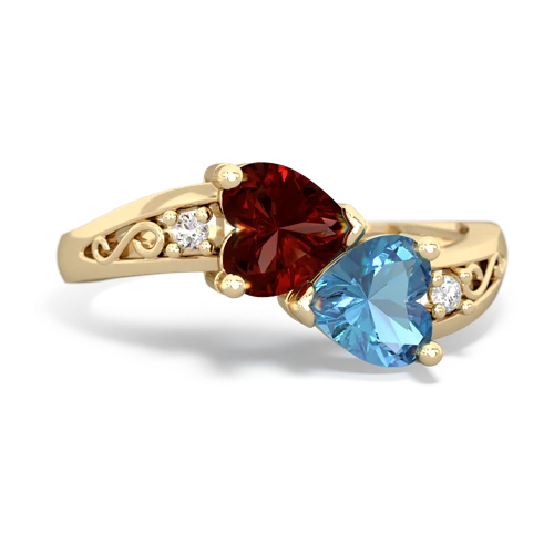 garnet-blue topaz filligree ring