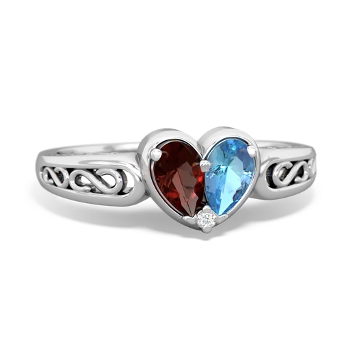 garnet-blue topaz filligree ring