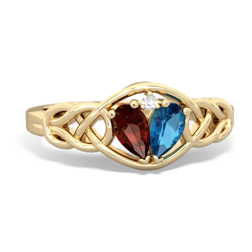 garnet-london topaz celtic knot ring