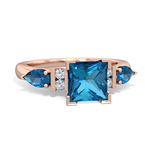 pink sapphire-blue topaz engagement ring