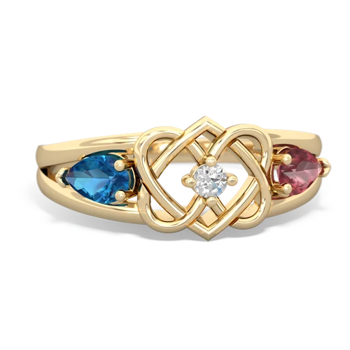 Genuine London Blue Topaz with Genuine Pink Tourmaline Hearts Intertwined ring