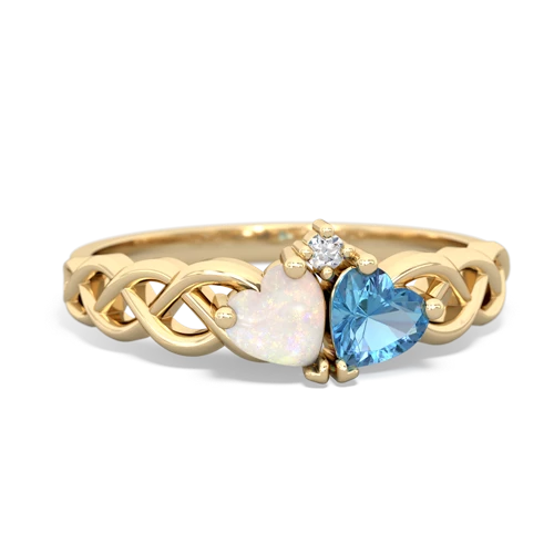 opal-blue topaz celtic braid ring