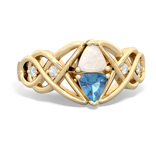 opal-blue topaz celtic knot ring